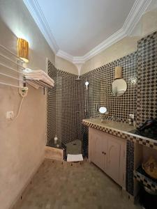 a bathroom with a sink and a toilet in it at Riad Jonan & Spa in Marrakesh