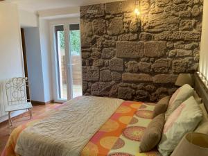 Postel nebo postele na pokoji v ubytování La Bastide de l'Olivier