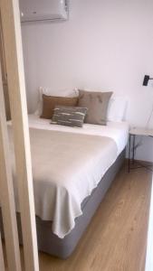 Ένα ή περισσότερα κρεβάτια σε δωμάτιο στο Oporto Chic & Cozy - Anibal Cunha