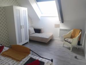 Posteľ alebo postele v izbe v ubytovaní Gite Super Henanbihen
