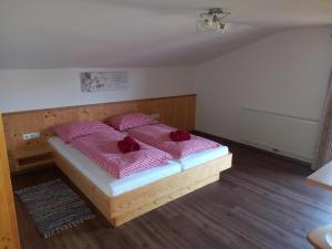 Postel nebo postele na pokoji v ubytování Hennleiten Hof