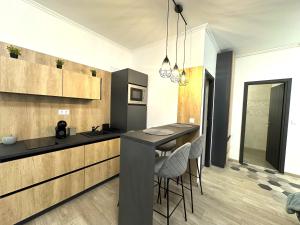 Kuchyň nebo kuchyňský kout v ubytování Berzsenyi Apartmanház