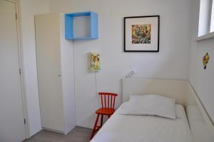 En eller flere senge i et værelse på Duinland 5 + 3 billeder