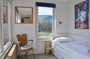 En eller flere senge i et værelse på Duinland 5