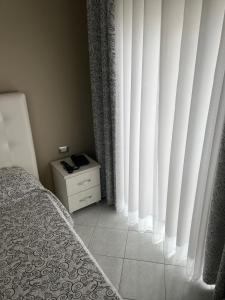 Postel nebo postele na pokoji v ubytování Hotel Marika