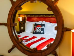 a reflection of a bed in a mirror at LEGOLAND(R) Windsor Resort in Windsor