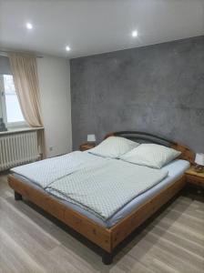 Postel nebo postele na pokoji v ubytování Ferienwohnung Ostfriesland