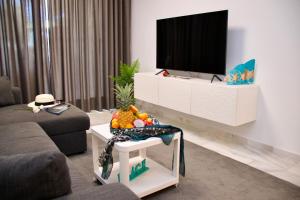 Duque Beachfront Elite TV 또는 엔터테인먼트 센터