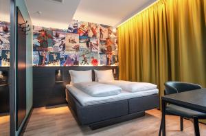 Postel nebo postele na pokoji v ubytování Thon Hotel Snø