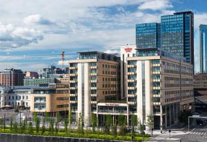 a group of tall buildings in a city at Thon Hotel Opera in Oslo