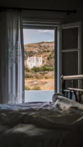 Posteľ alebo postele v izbe v ubytovaní Romano garden house - land tales