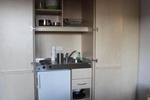 Кухня или мини-кухня в Apartment am Meer
