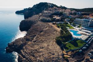 an aerial view of a resort on a cliff at THB Cala Lliteras in Cala Ratjada