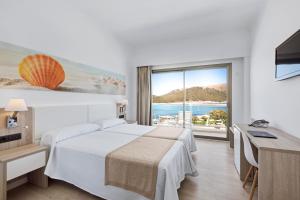 Кровать или кровати в номере THB Cala Lliteras - Adults Only