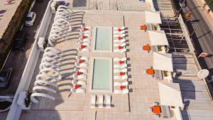 an overhead view of a building with a swimming pool at THB Naeco Ibiza - Adults Only in San Antonio Bay