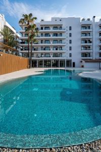 a large swimming pool in front of a building at THB Bamboo Alcudia in Port d'Alcudia