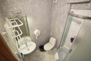 Koupelna v ubytování Coin Hotel