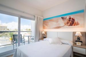 Posteľ alebo postele v izbe v ubytovaní THB Gran Playa - Adults Only