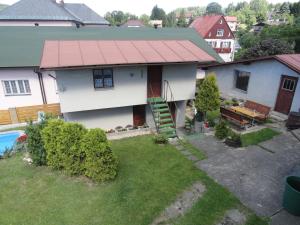 an aerial view of a house with a red roof at Chata SLUKA in Poniklá