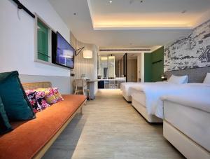 Rúm í herbergi á Boutech JianTan Hotel