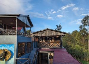 a building with an elephant painted on the side of it at Idembe Heritage in Gitarama