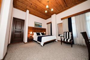 Postel nebo postele na pokoji v ubytování Hotel Bosnali