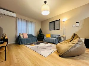 Posezení v ubytování JoyHome 天下茶屋駅7分4LDK一軒家 難波梅田黒門関空直通 無料駐車場