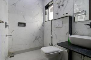 Koupelna v ubytování Hotel Roma Deluxe - New Delhi Railway Station + 37 fotografií