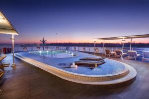 a swimming pool on the deck of a cruise ship at M/Y ALYSSA - 4 or 7 Nights From Luxor each Monday and 3 or 7 Nights From Aswan each Friday in Luxor