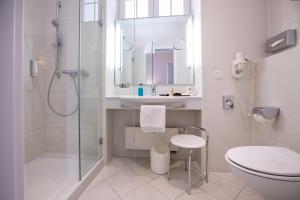Koupelna v ubytování Romantik Hotel Zehntkeller