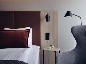 Postel nebo postele na pokoji v ubytování Quality Hotel Arlanda XPO