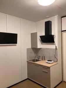 TV a/nebo společenská místnost v ubytování Budget apartment in Kotka # 16