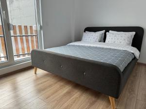 Säng eller sängar i ett rum på DD Apartments - Mavrovo