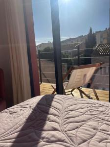 Un balcón o terraza en La Calanca - Appartement d'hôtes Centre ville de Sète parking gratuit