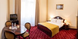 Voodi või voodid majutusasutuse George Hotel toas