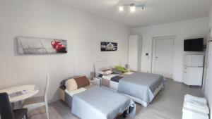 Ένα ή περισσότερα κρεβάτια σε δωμάτιο στο Nautica Tarello - Casa Ena BeB