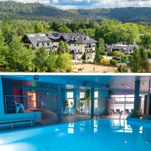 a house and a house with a swimming pool at Granada Pensjonat & SPA in Duszniki Zdrój