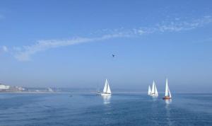 a group of sailboats floating in the water at Cosy 2-Bed Chalet in Bridlington - Free WiFi in Bridlington