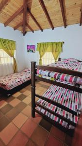 Кровать или кровати в номере mesa de los santos