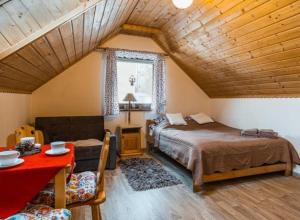 Posteľ alebo postele v izbe v ubytovaní Apartamenty ''Chcę Tu Zostać''