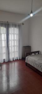 Postel nebo postele na pokoji v ubytování Casa alquiler temporario Necochea