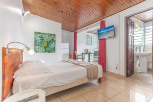 Postel nebo postele na pokoji v ubytování Studio 204 - Vanille - Proche plage