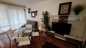 Posezení v ubytování Studio cosy 33 m² limite Lyon. Parking privatif. + 1 fotografie