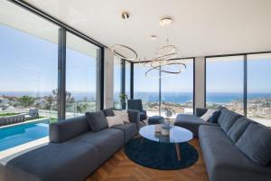 Zona de estar de 200m NEW Villa E with priv/heated pool, ocean view.