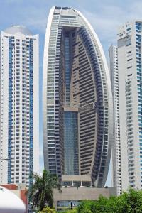 a large building in a city with tall buildings at JW MARRIOT in Panama City