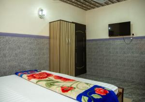 Uma cama ou camas num quarto em Haffy Executive Hotels and Suite