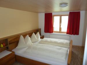 Voodi või voodid majutusasutuse Ferienhaus Schwendehof toas