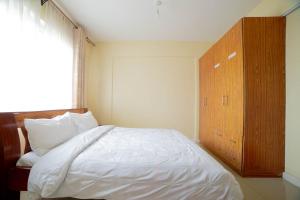 Katil atau katil-katil dalam bilik di Airport Vista Getaway-4km from jomo Kenyatta International Airport