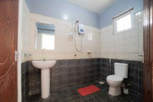 Bilik mandi di Airport Vista Getaway-4km from jomo Kenyatta International Airport