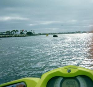 a speedometer on a boat in a body of water at NiceShortStayMassena in Massena